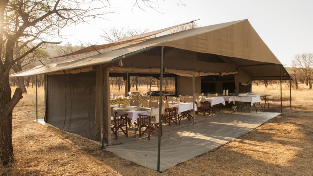 Ultimate Fly-Around Safari Holiday Katikati tented camp Central Serengeti Wildebeest & Zebra Calving Season in Tanzania